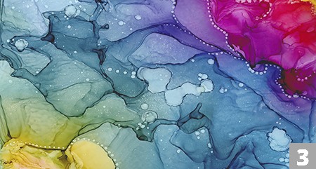 colorful water color splotches in magenta, teal, and yellow